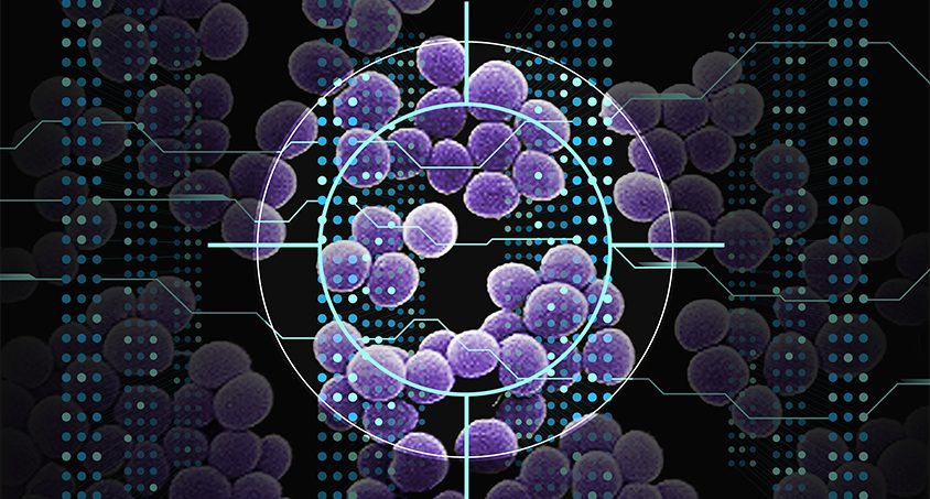 Image of a reticle aiming at a group of purple microscopic cells against a background of glowing dots.